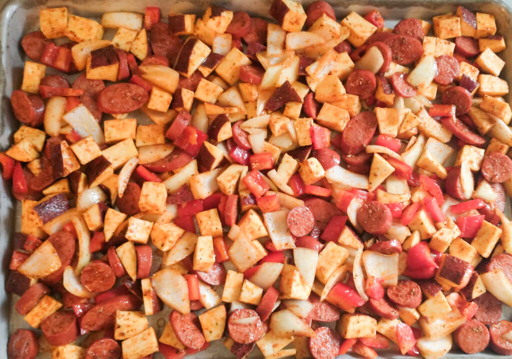 veggies and sausage on sheet pan ready to cook