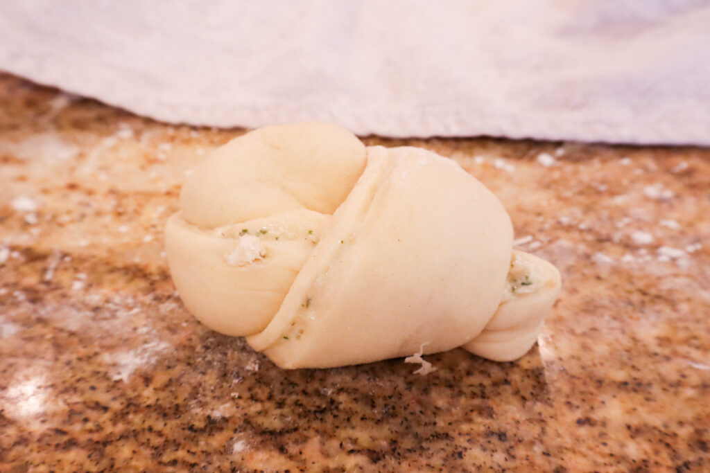 a knotted ribbon of dough