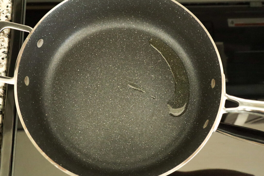 heating oil in high sided pan