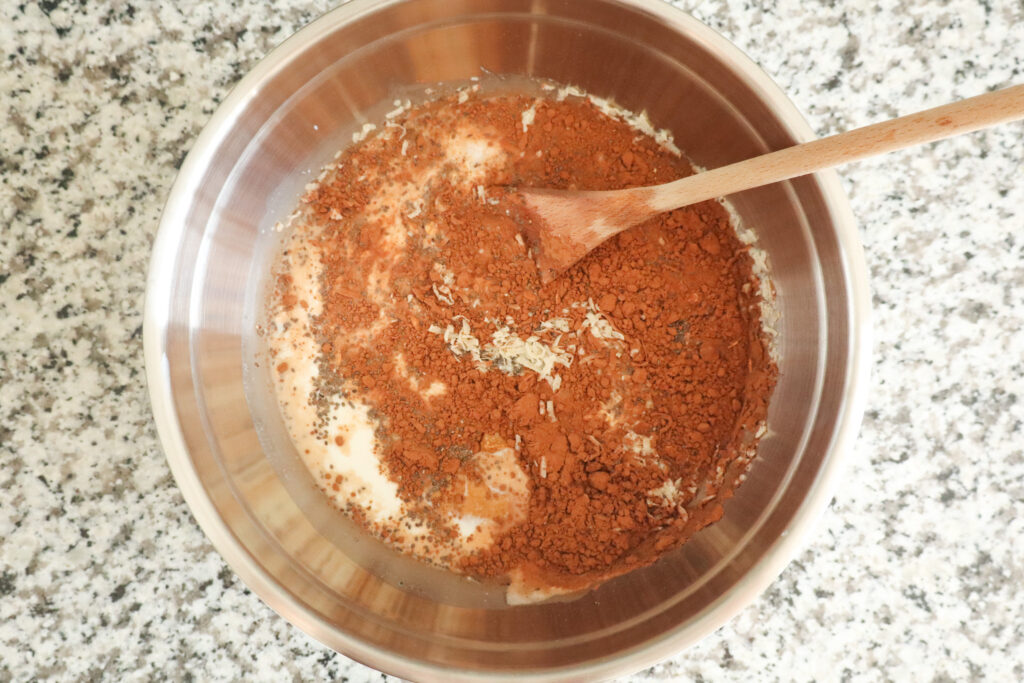 ingredients for peanut butter overnight oats in mixing bowl