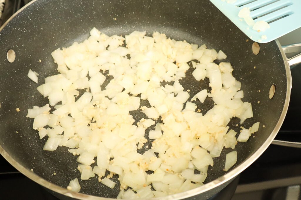 sauted onions and garlic in high sided pan