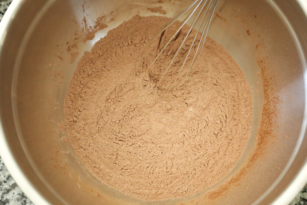 mixed dry ingredients for honey sweetened chocolate cupcakes
