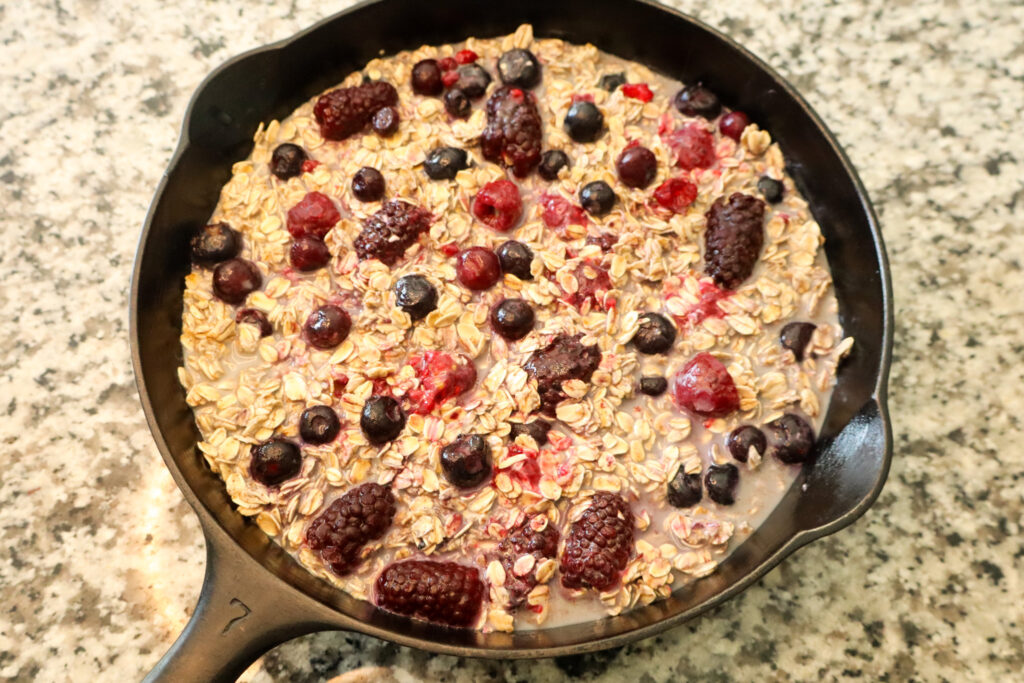 unbaked oatmeal in cast iron pan