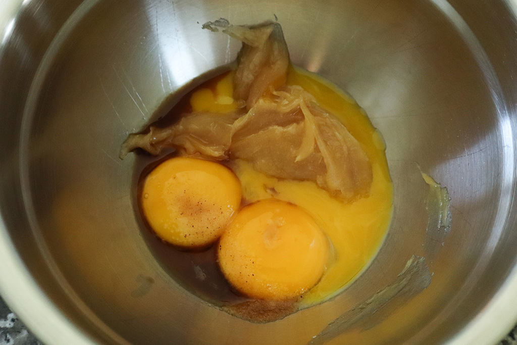 egg yolks and honey in mixing bowl
