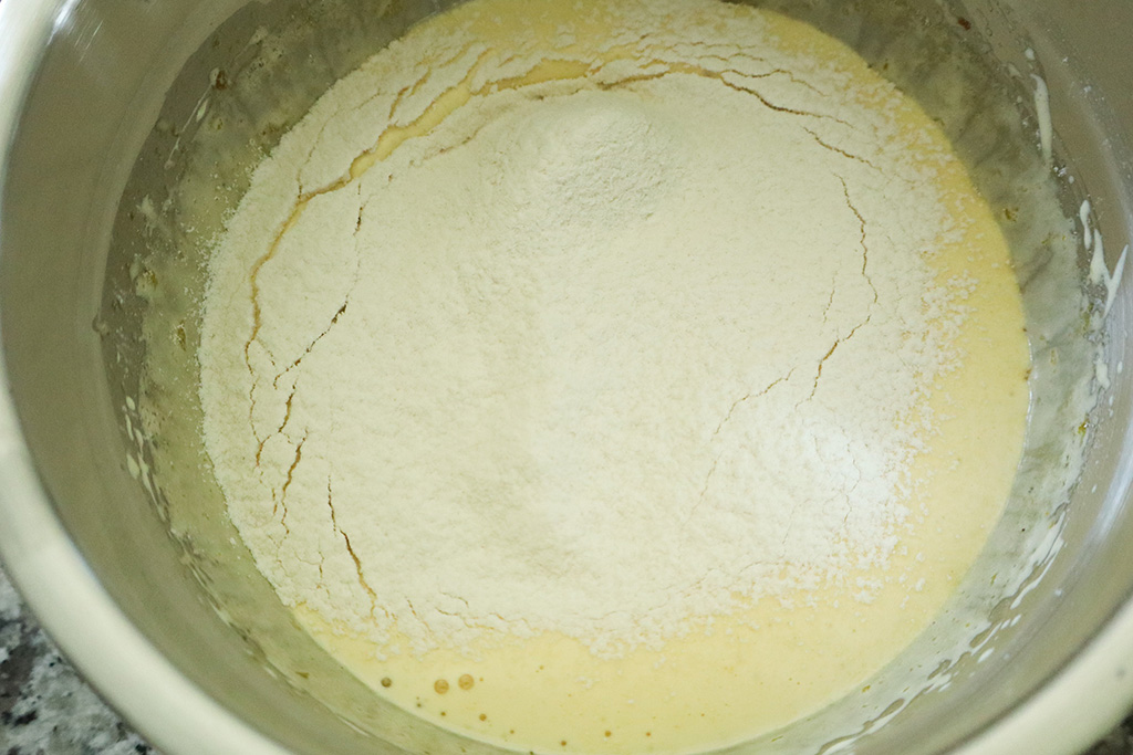sifted flour on top of whipped egg yolks