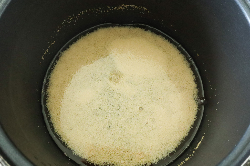 bloomed yeast in water and honey