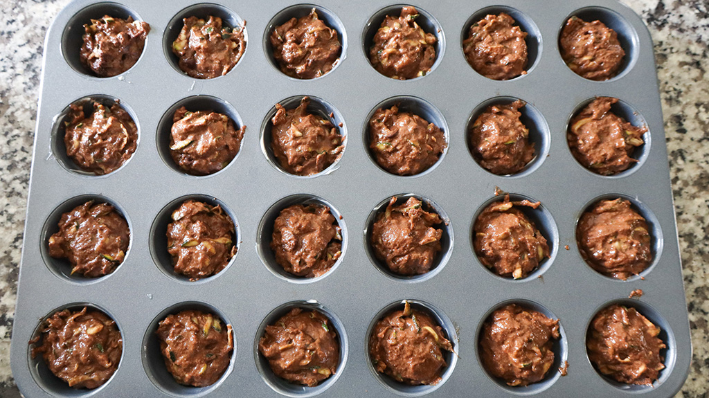 muffin batter in mini muffin tin