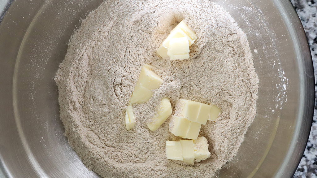 cubed butter in flour