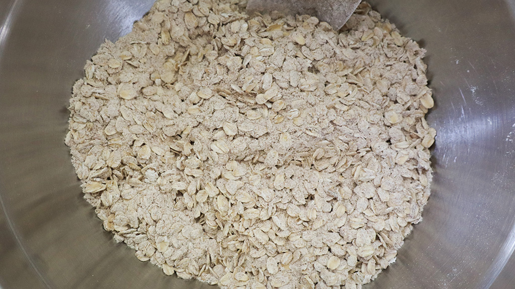 mixed up dry ingredients in stainless steel mixing bowl